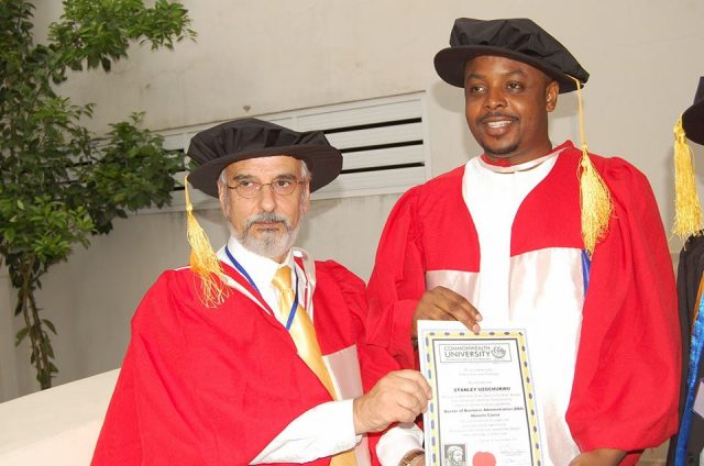 Stanel Boss receiving Honorary PhD Certificate
